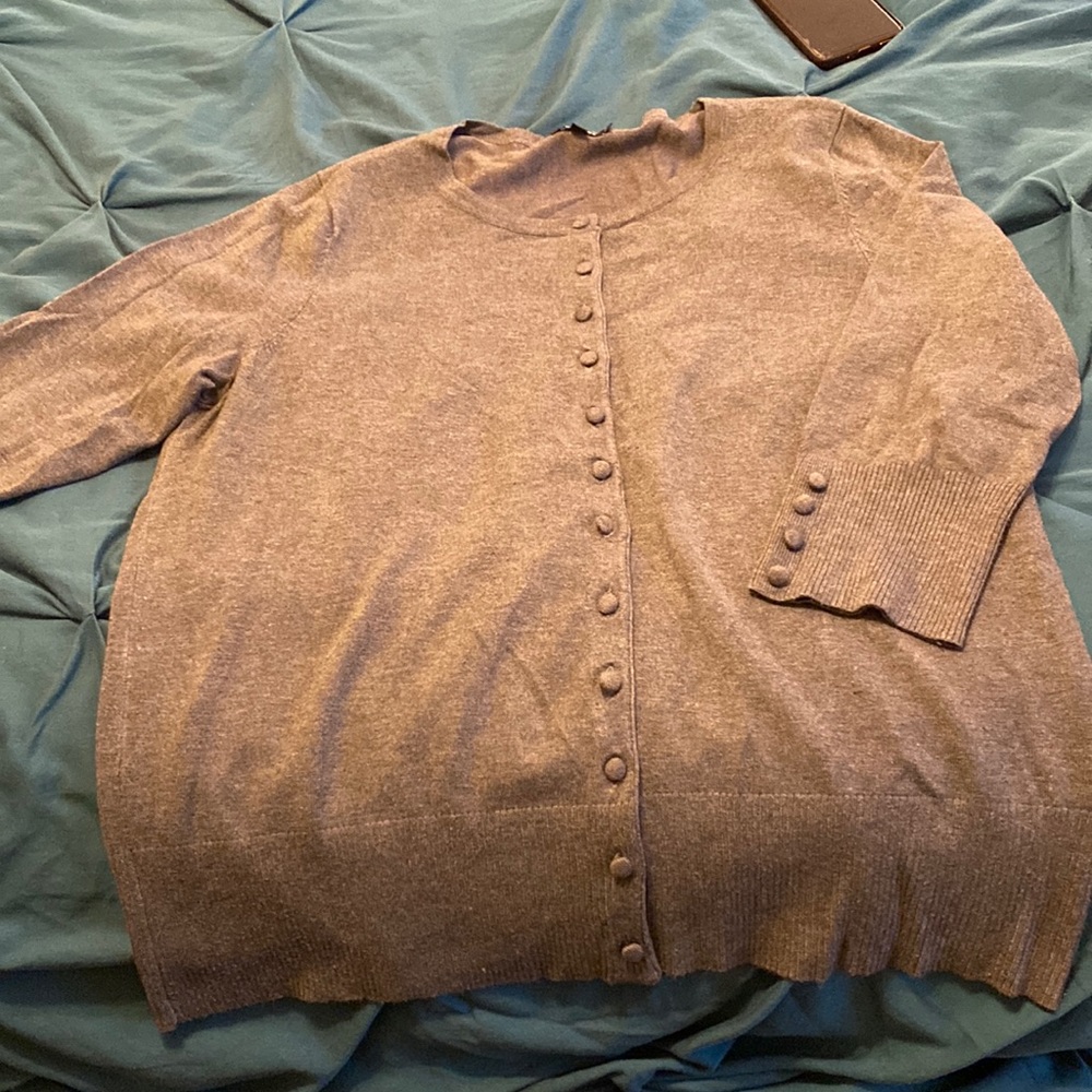 Medium gray cardigan.